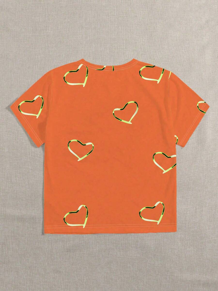 T-shirt arancione da donna con stampa a cuore