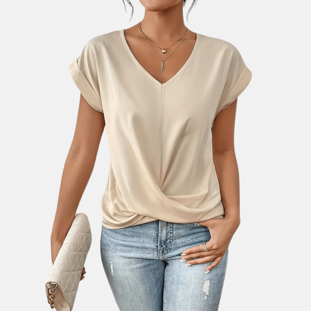 Camicetta da donna con scollo a V e orlo drappeggiato