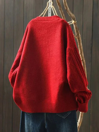 Cardigan oversize a trecce con bottoni